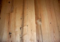 red Oak flooring, remilled from log house and barn timbers.