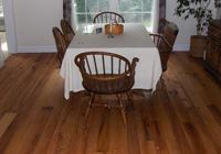 Red Oak flooring, remilled from log house and barn timbers.