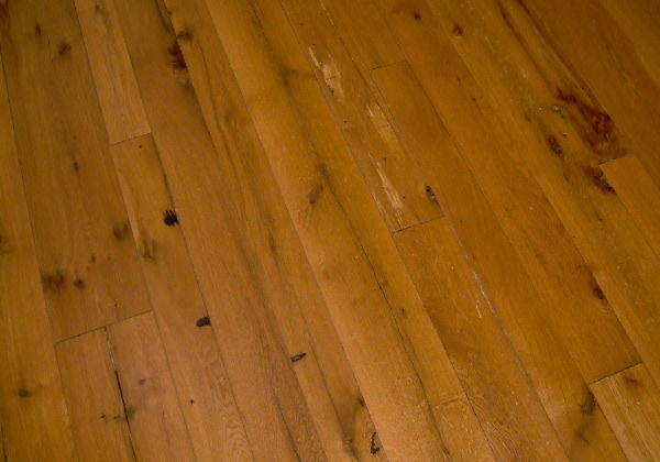 White Oak flooring, remilled from log house and barn timbers.